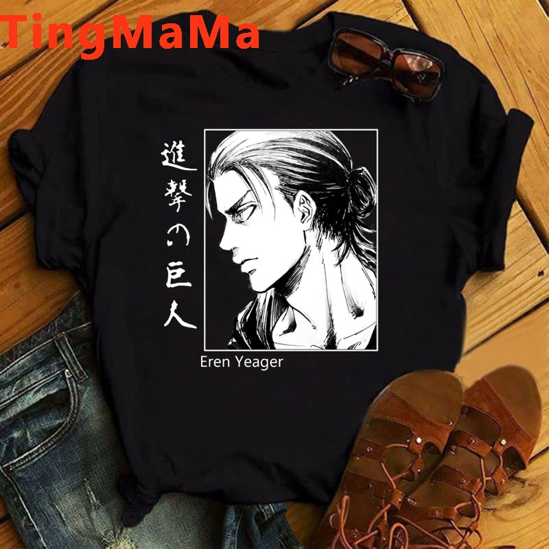 Attack on Titan Tshirt with Eren face front side angle manga print on table with jeans and sandals